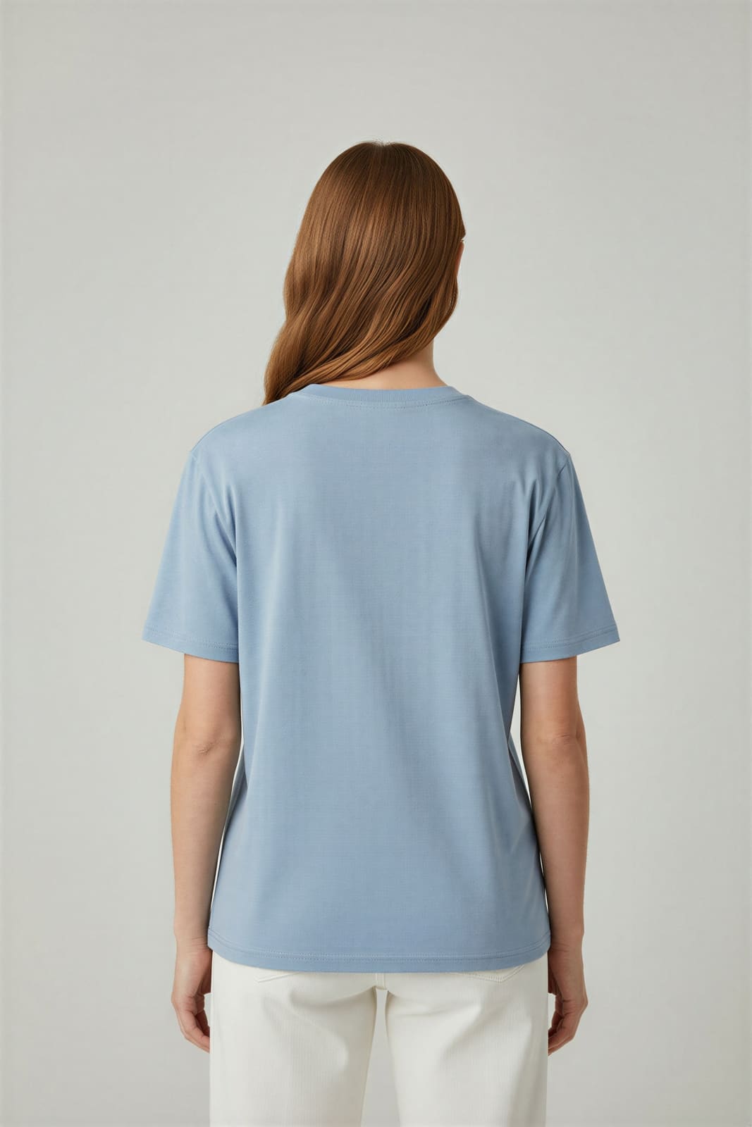 Light blue cotton tee with a tone-on-tone print, generated back view on the same model