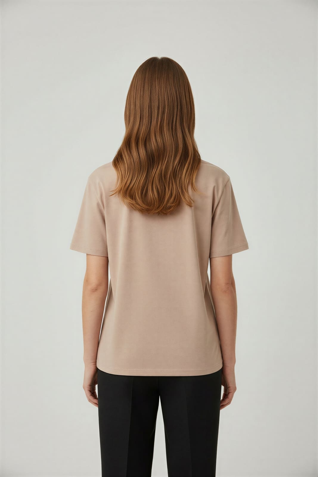 Dusty rose tee with a script print, generated back view on the same model