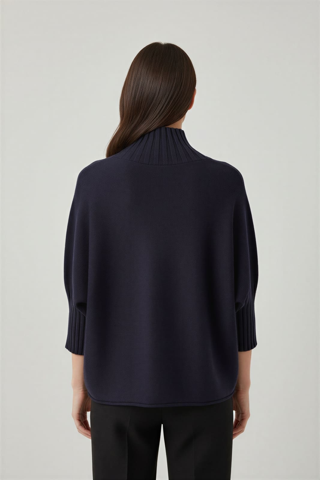 Navy mock-neck knit, generated back view on the same model